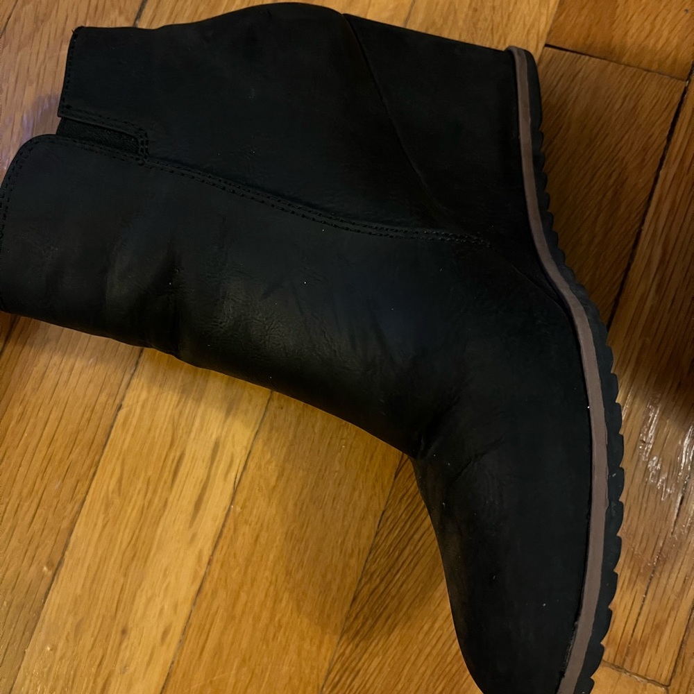Black booties.